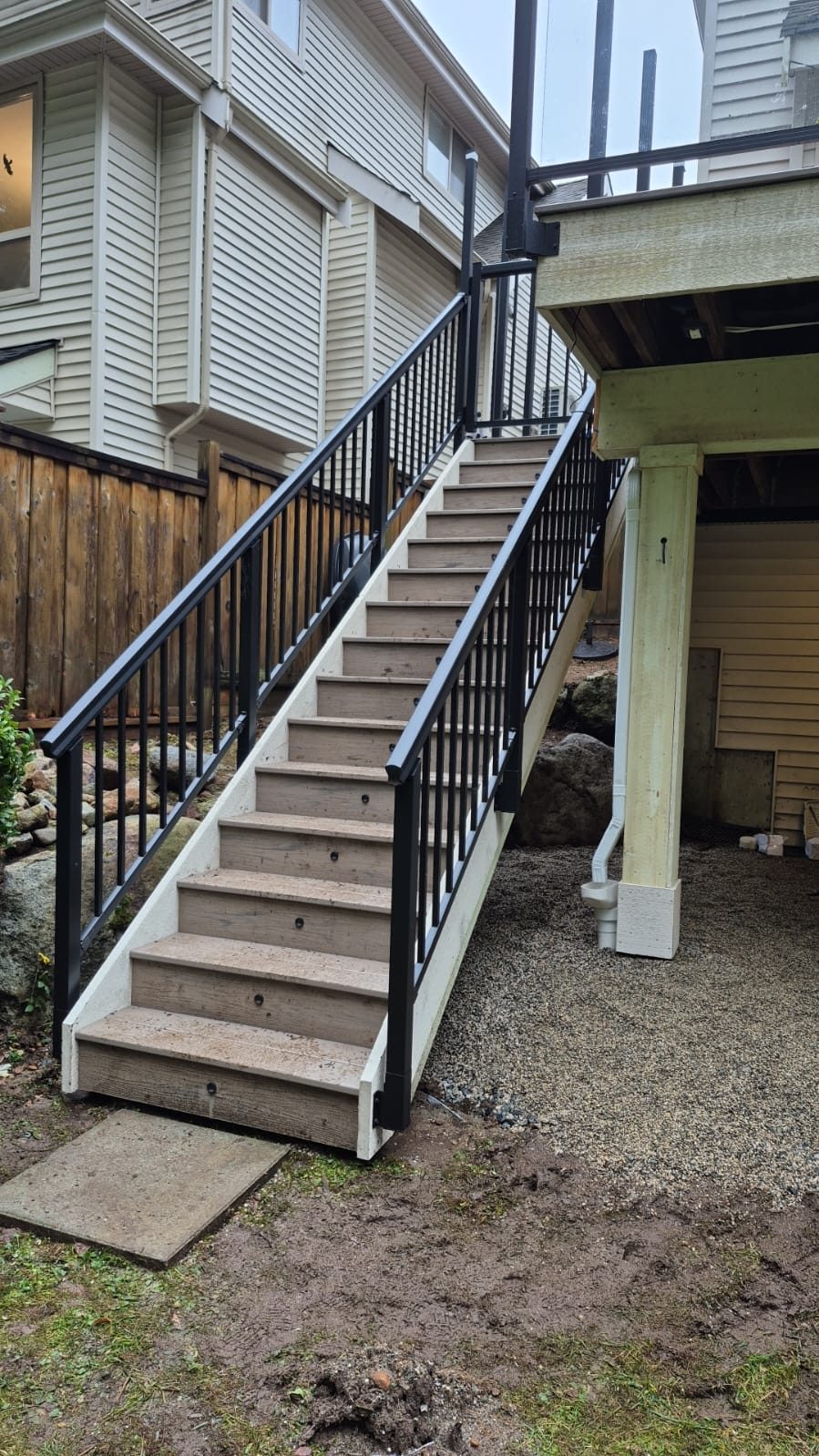 Aluminum picket railing on tall exterior stairs in Port Moody