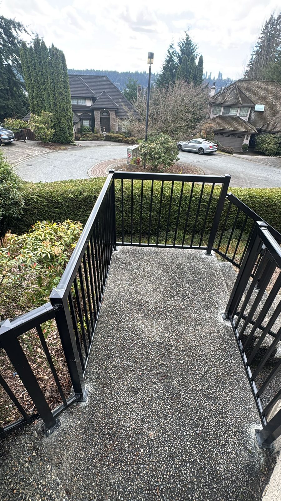 Black aluminum front entry railing in Ladner