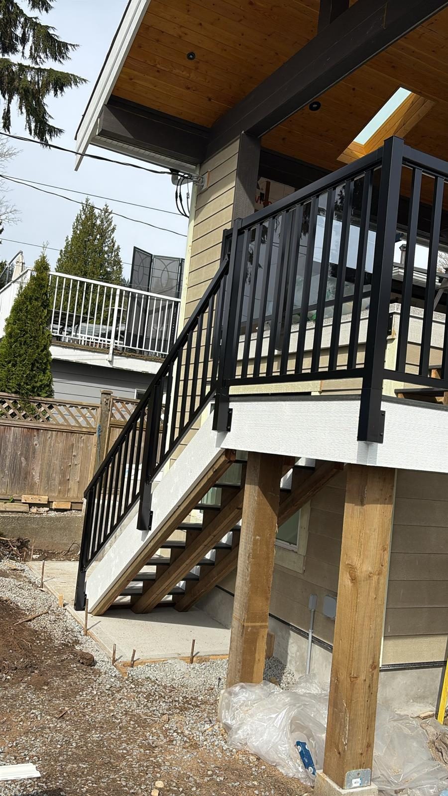 Black aluminum deck and stair railing on a Tsawwassen home