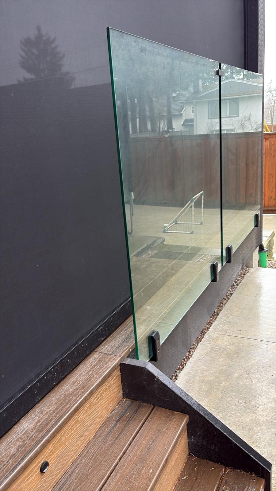 Glass railing panel on a deck in Delta