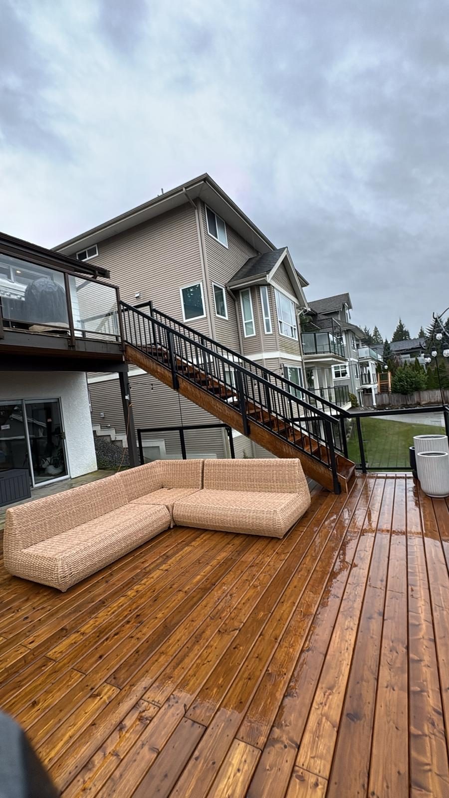 Aluminum picket stair railing on cedar deck stairs in Langley