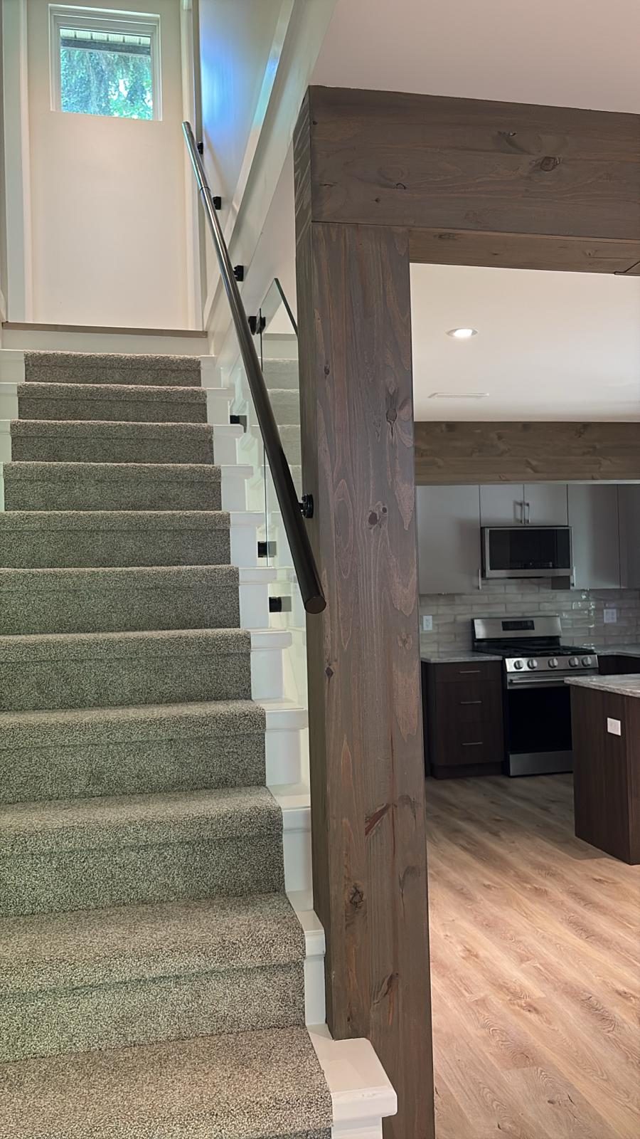 Interior staircase handrail installed in a Langley home