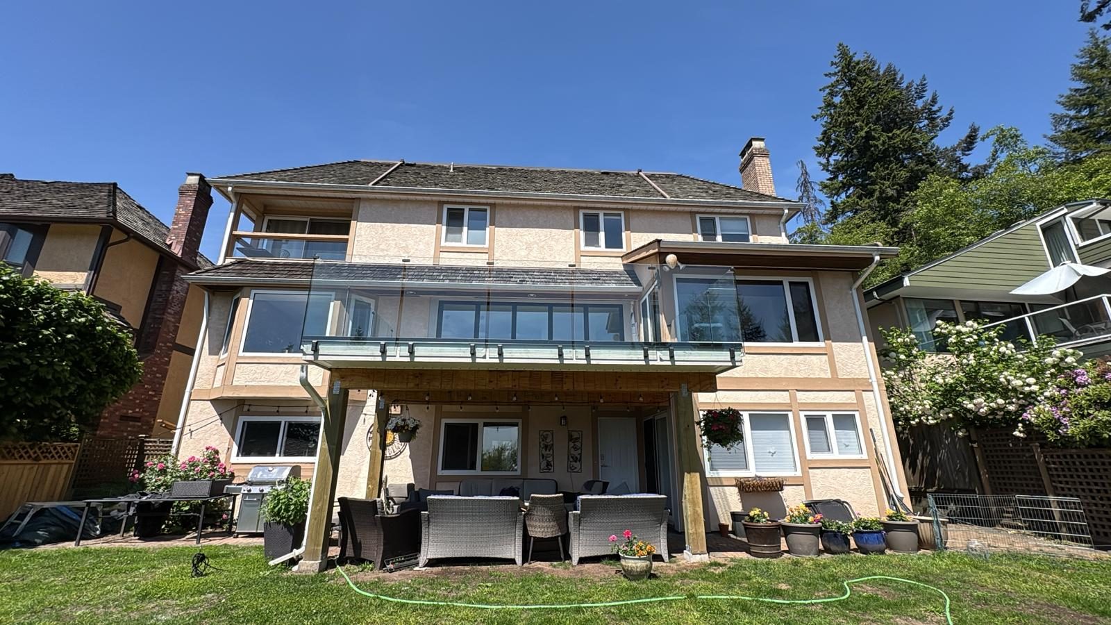 Glass balcony railings on a North Vancouver house