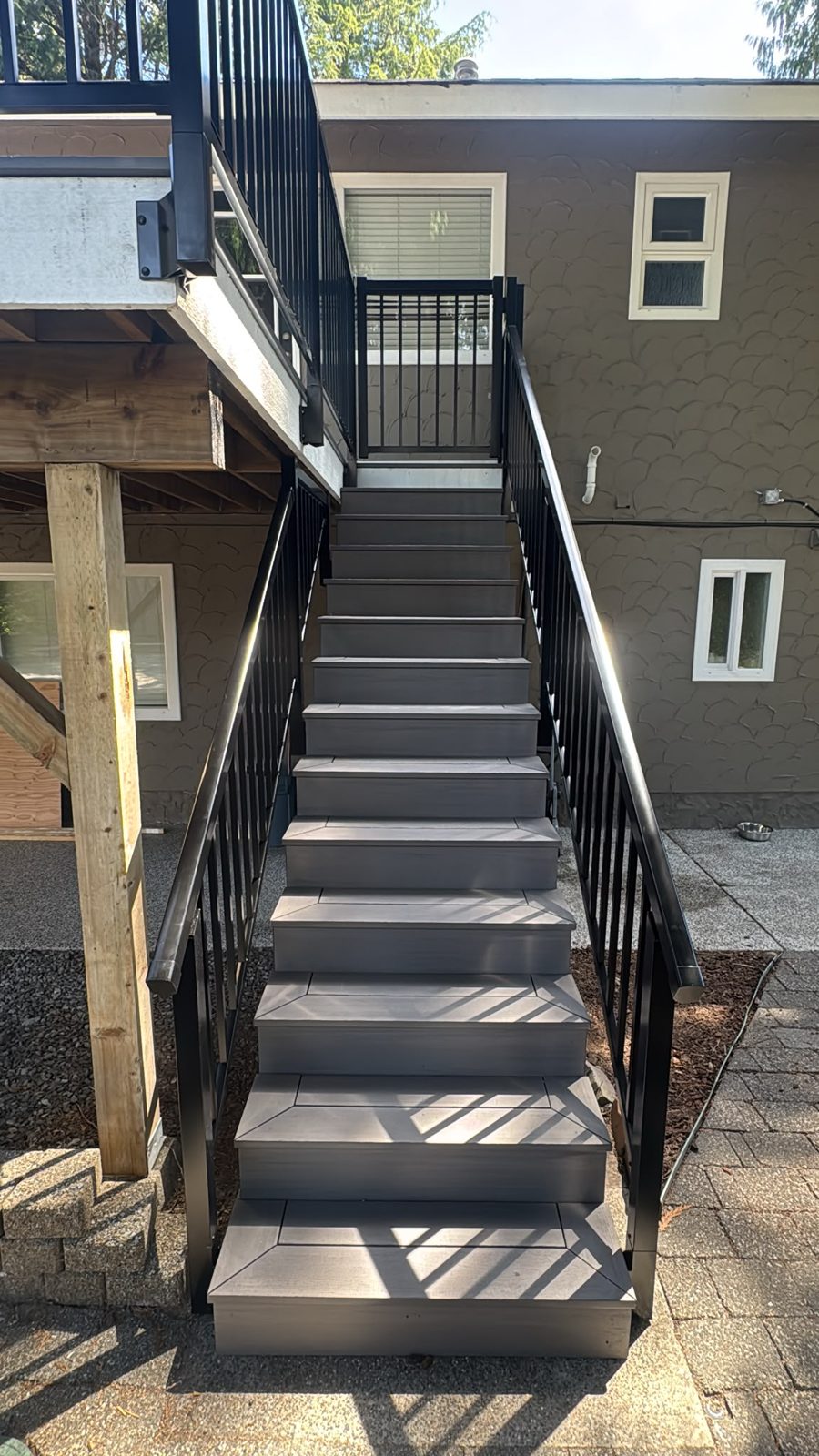 Aluminum picket railing on exterior stairs in North Vancouver